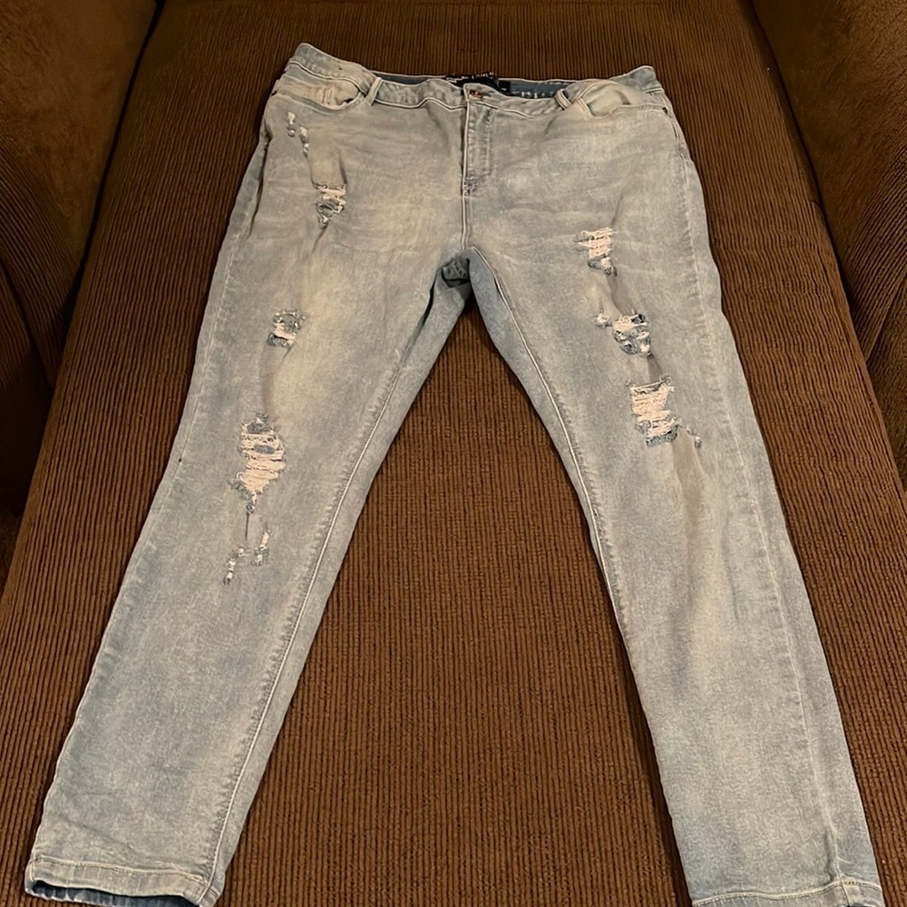 Distressed Light Blue Denim Jeans